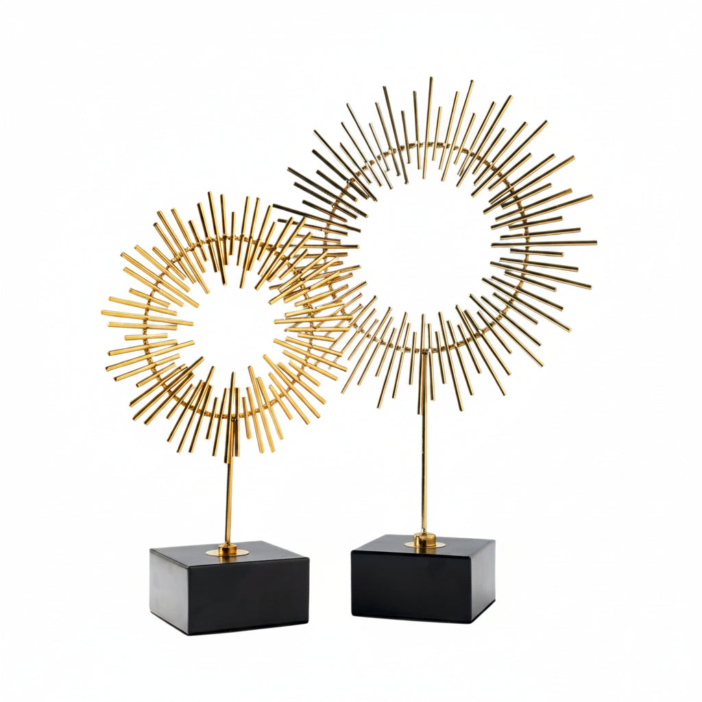 Gold-Tone Sunburst Sculpture on Black Cube Base